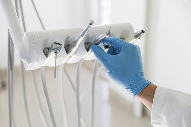 Professional Tooth Extraction technician working in Warrenville, IL